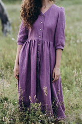 Vestido midi de media manga con cuello en V y botones